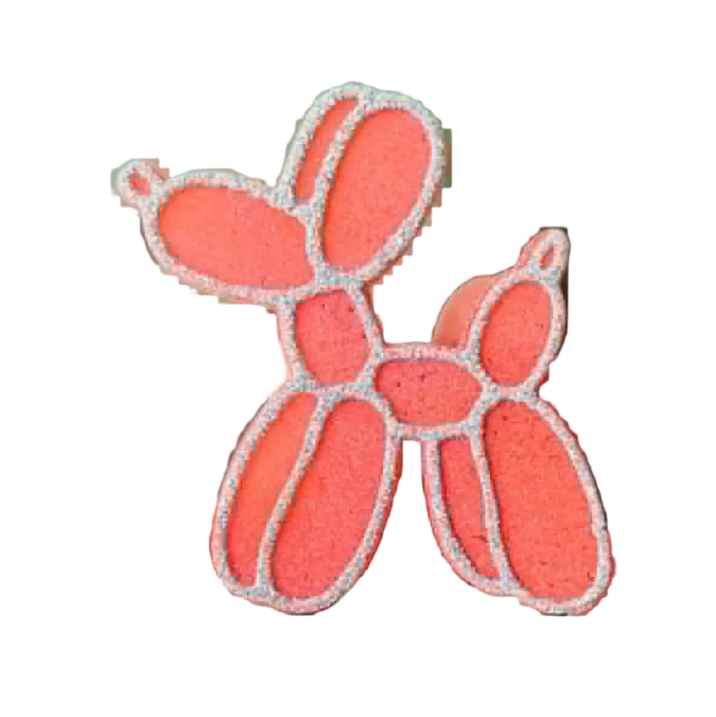 Coral colored balloon dog car freshie on a white background