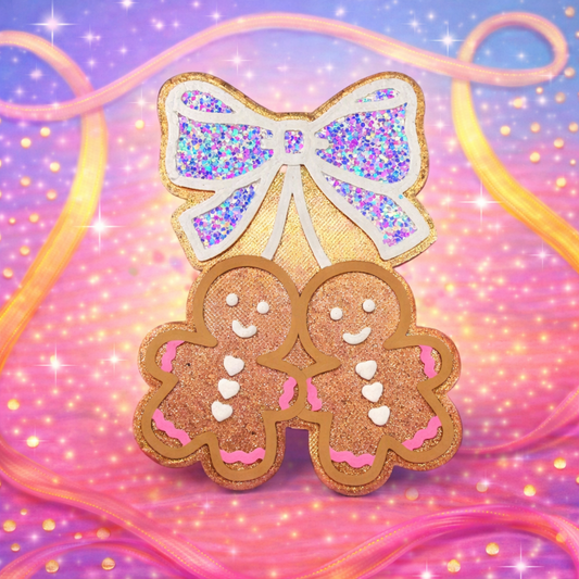 Set of Gingerbread  with a glittery bow on a colorful, sparkling background