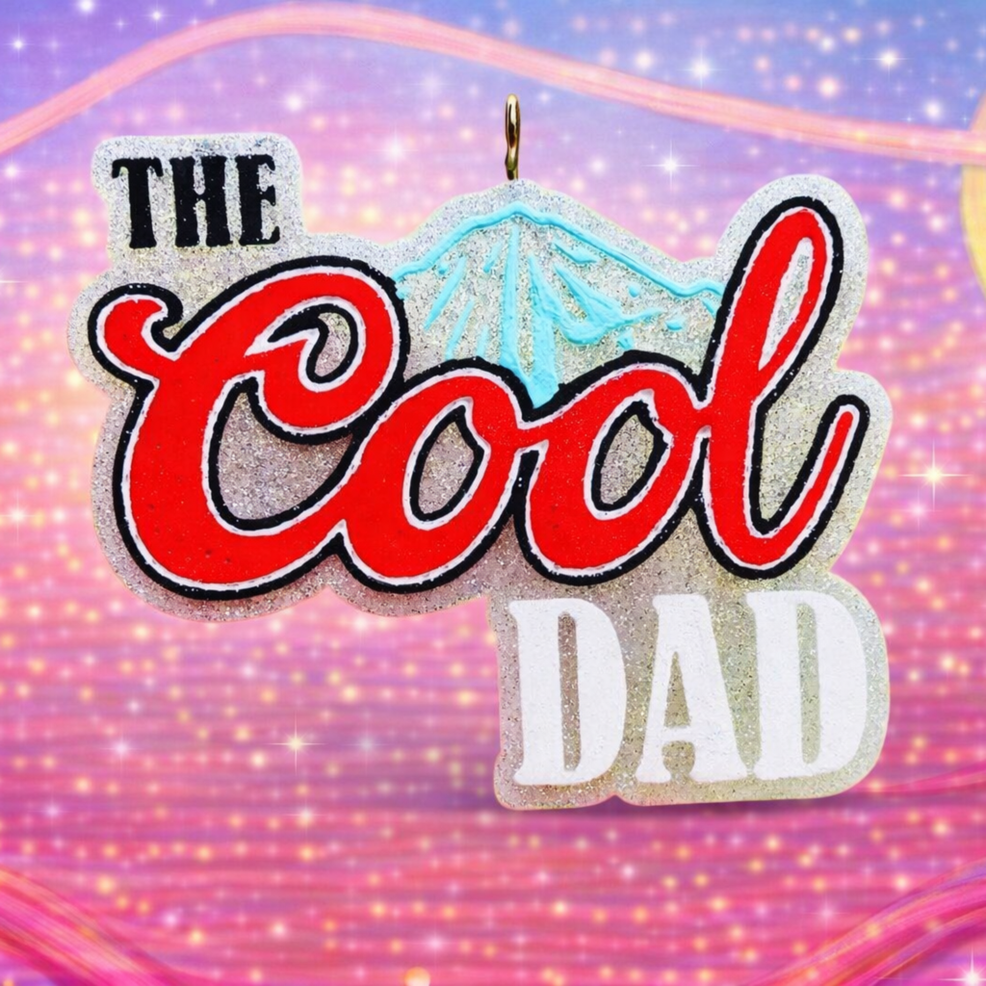 Decorative car freshie design with 'The Cool Dad' text on a colorful background