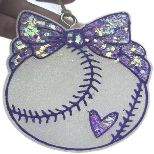 Decorative ball freshie design with a purple bow and heart design on a white background