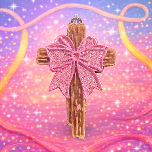 Wooden cross with pink glitter bow car freshie