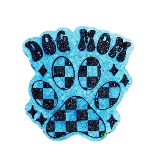 Blue and black glittery 'Dog Mom' paw print design on a white background